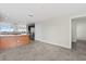 Open kitchen with granite counters and wood cabinets at 225 W Seminole Blvd # 512, Sanford, FL 32771