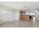 Open kitchen with granite counters and wood cabinets at 225 W Seminole Blvd # 512, Sanford, FL 32771