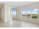 Living room with balcony access and water views at 225 W Seminole Blvd # 512, Sanford, FL 32771