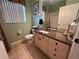 Clean bathroom with granite countertop and walk-in shower at 2306 Silver Palm Dr # 103, Kissimmee, FL 34747