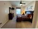 King bedroom with dresser and en-suite bathroom access at 2306 Silver Palm Dr # 103, Kissimmee, FL 34747