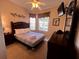 Cozy bedroom with a double bed and plenty of natural light at 2306 Silver Palm Dr # 103, Kissimmee, FL 34747