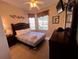 Cozy bedroom with a double bed and plenty of natural light at 2306 Silver Palm Dr # 103, Kissimmee, FL 34747