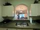 Kitchen with a view into living room at 2306 Silver Palm Dr # 103, Kissimmee, FL 34747