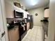 Kitchen with stainless steel appliances and granite countertops at 2306 Silver Palm Dr # 103, Kissimmee, FL 34747