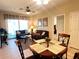 Living room and dining area with tile floor at 2306 Silver Palm Dr # 103, Kissimmee, FL 34747