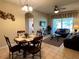 Living room and dining area with tile floor at 2306 Silver Palm Dr # 103, Kissimmee, FL 34747
