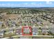 High-angle shot of homes within a residential neighborhood at 2731 Flintlock Ave, Clermont, FL 34711