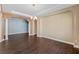 Open and spacious dining area with wood-look tile flooring at 2731 Flintlock Ave, Clermont, FL 34711