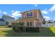 Attractive two-story residence with a landscaped front yard at 2731 Flintlock Ave, Clermont, FL 34711
