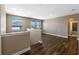 Spacious loft with wood-look laminate floors, recessed lighting, and neutral walls at 2731 Flintlock Ave, Clermont, FL 34711