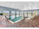 Indoor heated pool with brick pavers at 4112 Aberdeen Ln, Lake Wales, FL 33859