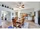 Dining room adjacent to kitchen and sunroom at 5025 St Andrews Arc, Leesburg, FL 34748