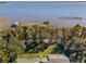 Aerial view of waterfront property with dock at 6320 Rocky Point Rd, Lake Wales, FL 33898
