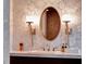 Bathroom with a sink and decorative mirror at 6320 Rocky Point Rd, Lake Wales, FL 33898