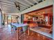 Indoor-outdoor kitchen and dining space with sliding glass doors opening to a patio at 6320 Rocky Point Rd, Lake Wales, FL 33898