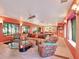 Living room with comfortable seating and view into kitchen at 6320 Rocky Point Rd, Lake Wales, FL 33898