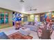 Relaxing living room with comfy seating and large artwork at 6320 Rocky Point Rd, Lake Wales, FL 33898