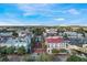 Aerial perspective of a town square, featuring buildings and a large Christmas tree at 745 Celebration Ave, Celebration, FL 34747