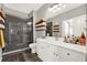 Spa-like bathroom with a walk-in shower and modern vanity at 745 Celebration Ave, Celebration, FL 34747