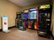 Hotel game room with various arcade games at 7601 Canada Ave # 221, Orlando, FL 32819