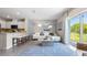 Bright living room with sliding glass doors leading to backyard at 1218 Balsam Dr, Davenport, FL 33837