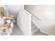 Modern staircase leading to the second floor at 1218 Balsam Dr, Davenport, FL 33837