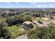 Aerial view of a house under construction in a wooded area at 1309 Errol Green Ct, Apopka, FL 32712