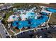 Community clubhouse and pool with ample parking at 1671 Kona Ln, Davenport, FL 33897