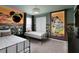 Themed bedroom featuring two twin beds and whimsical wall art at 1671 Kona Ln, Davenport, FL 33897