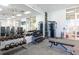 Well-equipped fitness center with weight machines and free weights at 1671 Kona Ln, Davenport, FL 33897