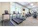 Fitness center with treadmills, stationary bikes, and other cardio equipment at 1671 Kona Ln, Davenport, FL 33897