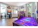 Community game room with air hockey, arcade games, and other entertainment options at 1671 Kona Ln, Davenport, FL 33897