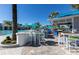 Outdoor bar and dining area by the pool at 1671 Kona Ln, Davenport, FL 33897