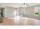 Spacious living room featuring hardwood floors and lots of natural light at 2015 Erving Cir # 108, Ocoee, FL 34761