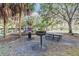 Community playground with picnic tables and grill at 2015 Erving Cir # 108, Ocoee, FL 34761