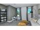 Cozy playroom with a comfy couch and built in shelving at 3022 Norcott Dr, Davenport, FL 33837