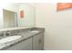 Modern bathroom with a double vanity and granite countertop at 328 Conway Ave, Saint Cloud, FL 34771