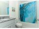 Bathroom features a shower/tub combo, granite vanity top, and tiled floor at 328 Conway Ave, Saint Cloud, FL 34771