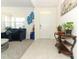 Welcoming foyer with tiled floor, stylish decor, and access to living area at 328 Conway Ave, Saint Cloud, FL 34771