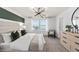 Main bedroom with a king-size bed and large window at 3645 Cambridge Brook Dr, Davenport, FL 33837