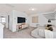 Spacious loft area with a built-in media console and seating at 3645 Cambridge Brook Dr, Davenport, FL 33837