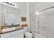 Clean bathroom with a toilet, sink, and shower at 4756 Ormond Beach Way, Kissimmee, FL 34746