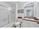 Clean bathroom with a shower/tub combo and updated vanity at 4756 Ormond Beach Way, Kissimmee, FL 34746