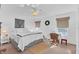 Main bedroom with king-size bed and workspace at 4756 Ormond Beach Way, Kissimmee, FL 34746