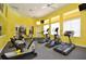 Well-equipped fitness center with treadmills, ellipticals and stationary bikes at 4756 Ormond Beach Way, Kissimmee, FL 34746