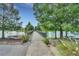 Scenic wooden footbridge over the lake, perfect for relaxing strolls at 4756 Ormond Beach Way, Kissimmee, FL 34746