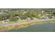 Aerial view of the property near a lake at 507 Orange Ave, Ocoee, FL 34761