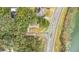 Aerial view of a property situated near a road and a body of water at 507 Orange Ave, Ocoee, FL 34761