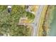 Aerial view of a property situated near a road and a body of water at 507 Orange Ave, Ocoee, FL 34761